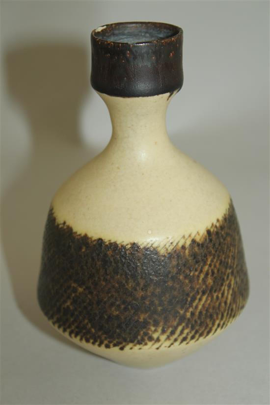 Dame Lucie Rie D.B.E. (1902-1995). A porcelain bottle vase and a small flaring bowl, diam. 9.5cm, faults